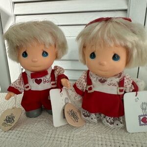 Precious Moments Red and White Dolls